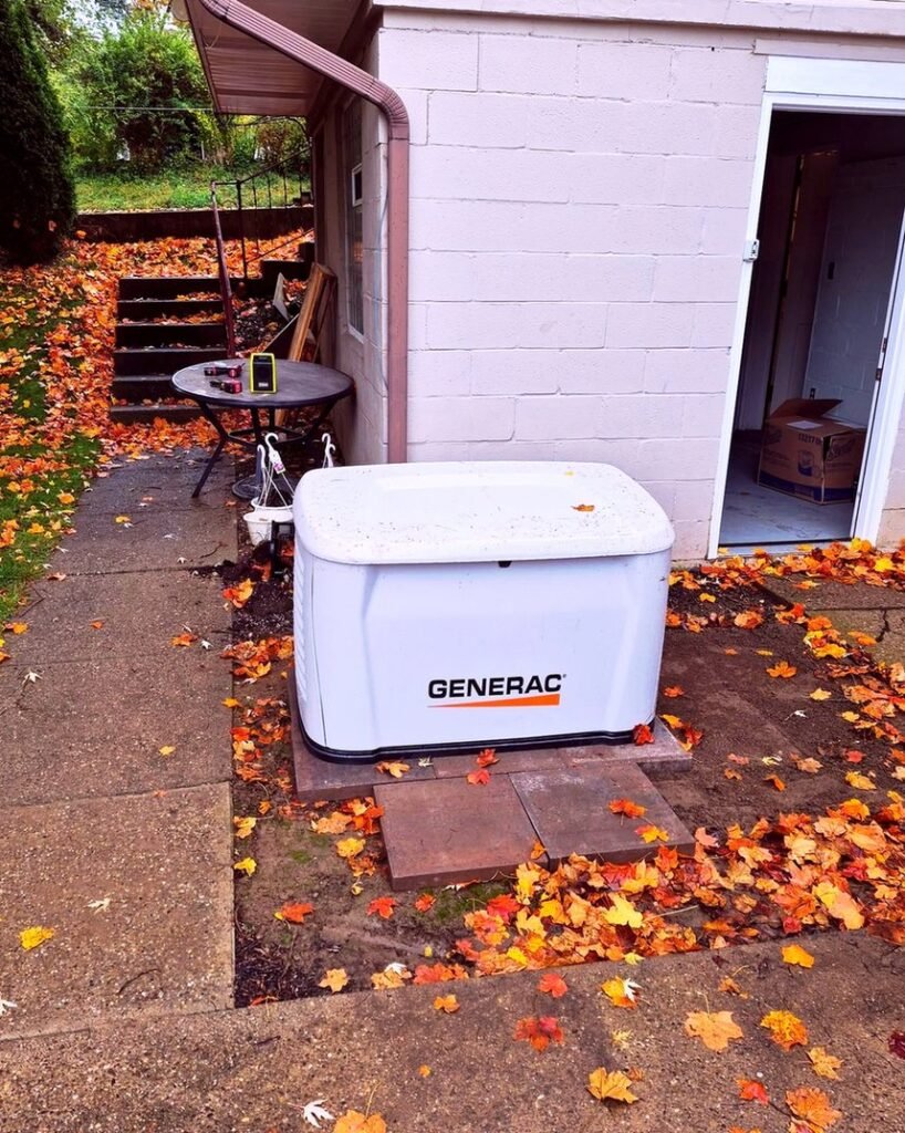 Generac standby generator on a backyard pad in Plattsburgh, NY