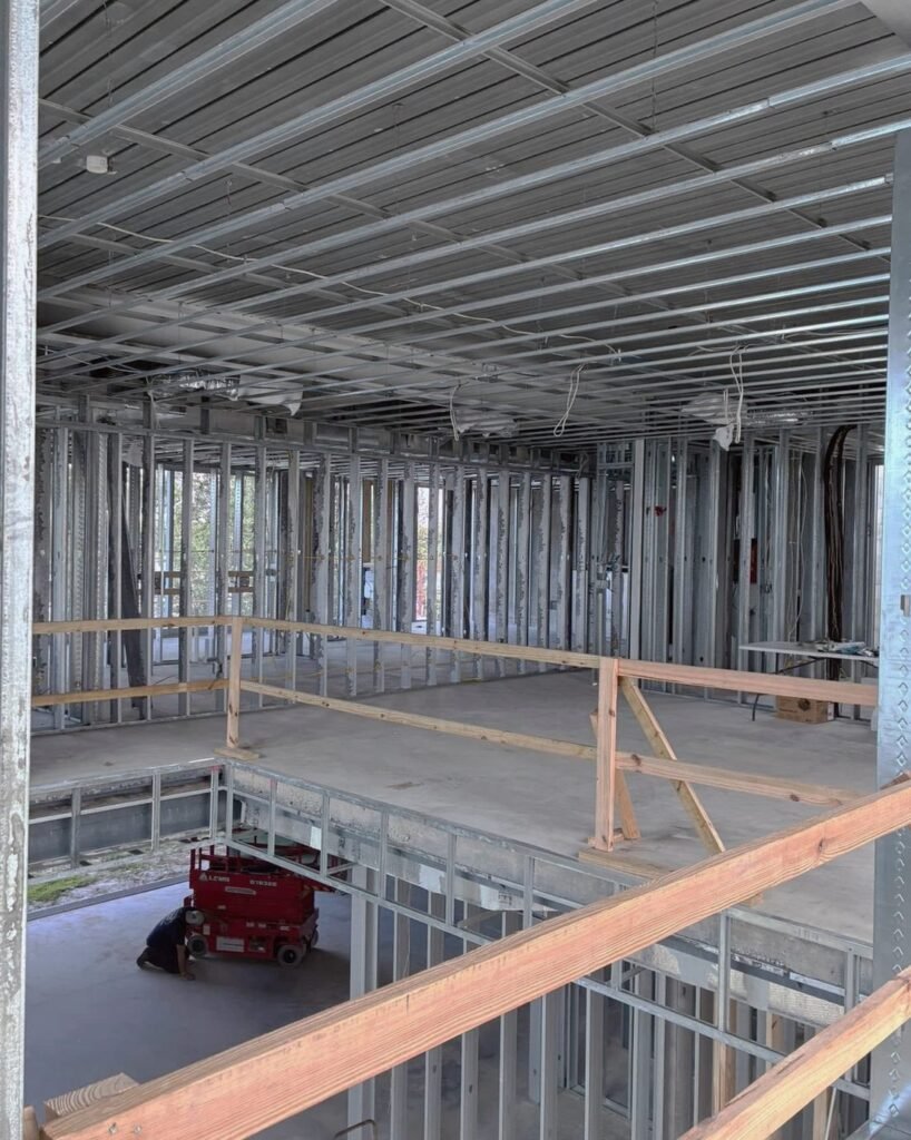 Rough wiring running overhead in a commercial space in Plattsburgh, NY