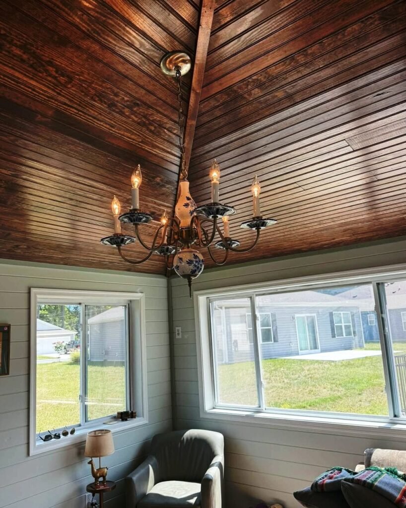 Decorative chandelier hanging in a sunroom in Plattsburgh, NY