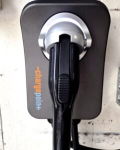 ChargePoint EV charger mounted on a garage wall in Plattsburgh, NY