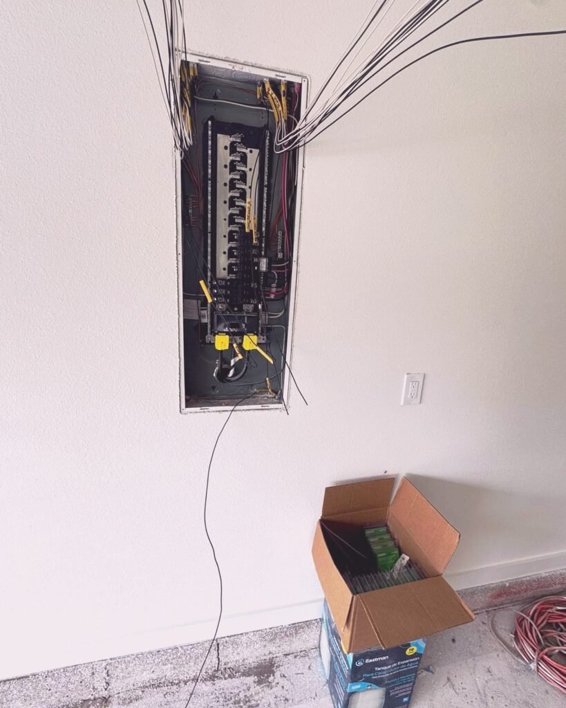 Electrical panel upgrade with exposed wiring in Plattsburgh, NY